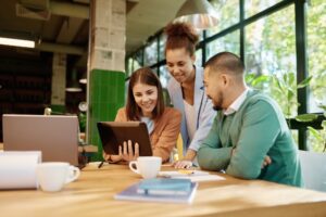 Multiracial office coworker team using digital tablet